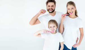 family-brushing-teeth-slide